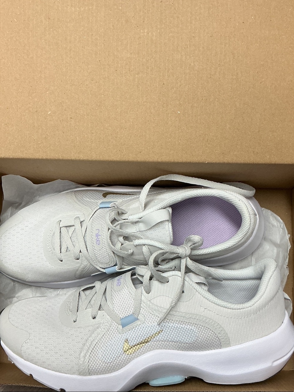 Nike Women’s White Sneakers with Gold Swoosh and Lilac Insole
